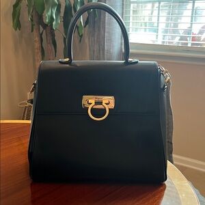 Salvatore Ferragamo Black Leather Handbag – Gold Clasp, Timeless Elegance
